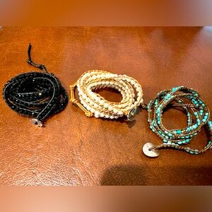 Multilayer beaded bracelets.